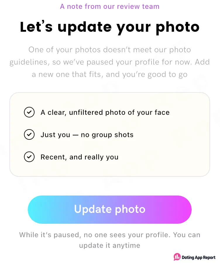 A review notice says the profile is paused over a photo-guideline issue and is not visible to anyone while paused.